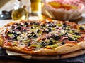 Tasty supreme pizza with olives peppers onions and sausage Royalty Free Stock Photo