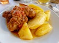 A tasty `sutzoukia` meat balls served with potatoes, traditional Greek plate.