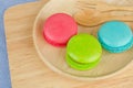 Tasty Sweet Macaroons on wooden background