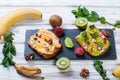 Tasty sweet sandwiches with bananas, nuts and chocolate, kiwi, s