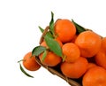 Tasty tangerine in a wooden basket