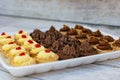 Tasty tarlets with vanilla cream and raspberry confi, chocolate cream and toffie