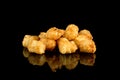 Tasty Taters Fries with reflection isolated on black background