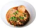 Thai Rice vermicelli noodles soup with beef and one big beef ball in white bowl isolated on white background. Royalty Free Stock Photo