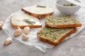 Tasty toasted bread with spreads on table Royalty Free Stock Photo