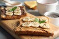 Tasty toasts with banana, mint and chia seeds on board
