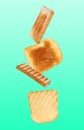 Tasty toasts falling on background