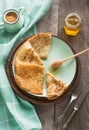 Tasty traditional russian breakfast of slapjack with honey on plate. Rustic style. Space for your text. Royalty Free Stock Photo