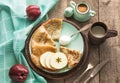 Tasty traditional russian breakfast of slapjack with honey on plate. Rustic style. Space for your text. Royalty Free Stock Photo