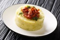 Tasty Trinxat mashed potatoes and green cabbage with fried bacon closeup in a plate. horizontal Royalty Free Stock Photo
