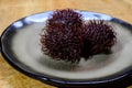 Tasty tropical exotic fruits, ripe fresh unpeeled hairy rambutan southeast Asian fruits rambutan southeast Asian fruits