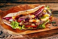 Tasty Turkish doner kebab on toasted tortilla Royalty Free Stock Photo