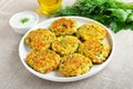 Tasty vegetable cutlets from zucchini, carrot, herbs