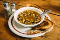 Tasty Vegetable soup with toasts on the table. Royalty Free Stock Photo