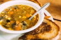 Tasty Vegetable soup with toasts on the table. Royalty Free Stock Photo