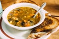 Tasty Vegetable soup with toasts on the table. Royalty Free Stock Photo