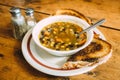 Tasty Vegetable soup with toasts on the table. Royalty Free Stock Photo