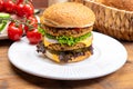 Tasty vegetarian cheeseburgers with round patties or burgers made from grains, vegetables and legumes