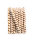 Tasty wafer roll sticks on white background, top view. Royalty Free Stock Photo