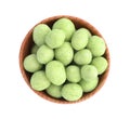 Tasty wasabi coated peanuts in bowl on white background, top view Royalty Free Stock Photo