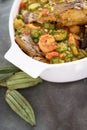 A tasty white bowl of Seafood Okra or Nigerian Okra Soup
