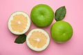 Tasty whole and cut sweeties on pink background, flat lay