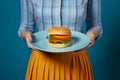 Cheeseburger woman unhealthy food fat hamburger holding eat person burger female