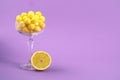 Tasty yellow chewing gums and lemon on background. Space for text