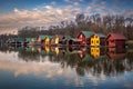 Tata, Hungary - Fishing cottages by the Lake Derito Derito to at sunset with reflections and colourful sky