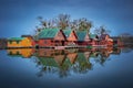 Tata, Hungary - Wooden Fishing Cottages On A Small Island At Lake Derito Derito To At Blue Hour