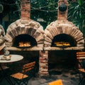 Tatars cooking in ovens at an outdoor cafÃÂ©