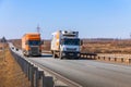 Tatarstan, Russia, Interstate Highway M7 - Apr 14th 2021. The IVECO truck overtakes the SCANIA truck. Trucks move along the