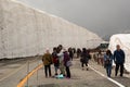 Tourists at snow corridor. Murodo. Tateyama Kurobe alpine route. Japan Royalty Free Stock Photo