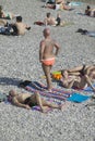 Tatooed man on beach, Nice, France