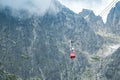 TATRANSKA LOMNICA, SLOVAKIA, AUGUST 2020 - Red cabin of cableway from Skalnate pleso to peak Lomnicky Stit in High Royalty Free Stock Photo