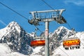 Ski lift and peak Lomnicky stit in High Tatras mountains in resort Tatranska Lomnica, Slovakia