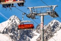 Ski lift and peak Lomnicky stit in High Tatras mountains in resort Tatranska Lomnica, Slovakia Royalty Free Stock Photo