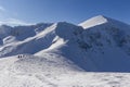 Snowy Tatry mountains landscape - snow and toutists Royalty Free Stock Photo