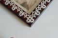 Closeup Corner detail Fine Thread Tatted Edging Picture Frame