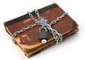 Tattered book with chain and padlock Royalty Free Stock Photo