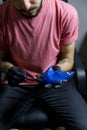 Tattoo artist doing tattoo in tatoo salon. Master makes tattoo in tattoo studio Royalty Free Stock Photo