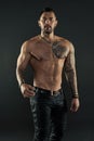 Tattoo culture concept. Tattoo brutal attribute. Man brutal unshaven hispanic appearance tattooed arms. Bearded man show