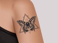 Tattoo on female shoulder. Mystic butterfly tattoo. Template of banner for tattoo parlor