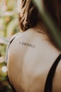 A tattoo on the back of a girl