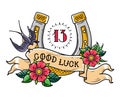 Tattoo gold horseshoe with roses, swallow, mystical number 13 and ribbon with lettering Good Luck.