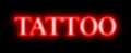 Tattoo red neon sign Royalty Free Stock Photo