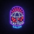 Tattoo salon logo in a neon style. Neon sign, emblem, umbrella symbol, light billboards, night shining banner, neon Royalty Free Stock Photo