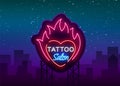 Tattoo salon logo vector. Neon sign, a symbol of heart in the fire, a bright luminous billboard, a night banner, neon Royalty Free Stock Photo