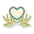 tattoo style sticker of a swallows and a heart