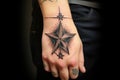 tattoo on wrist featuring a cowboy hat and sheriffs star Royalty Free Stock Photo